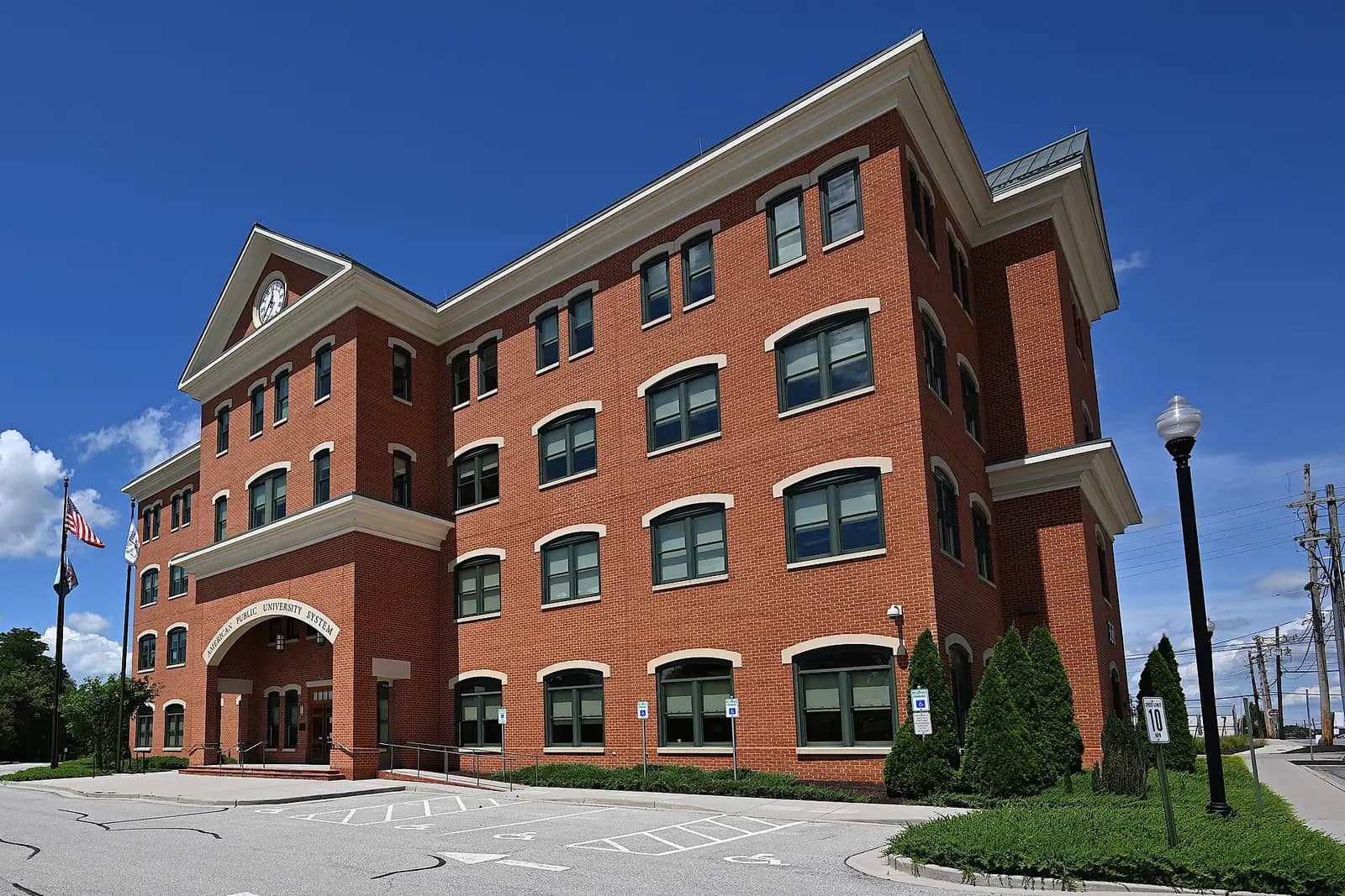 American Public University System campus — One of the buildings for Ameican Public University System with the name engraved above to door. 330 North George Street,